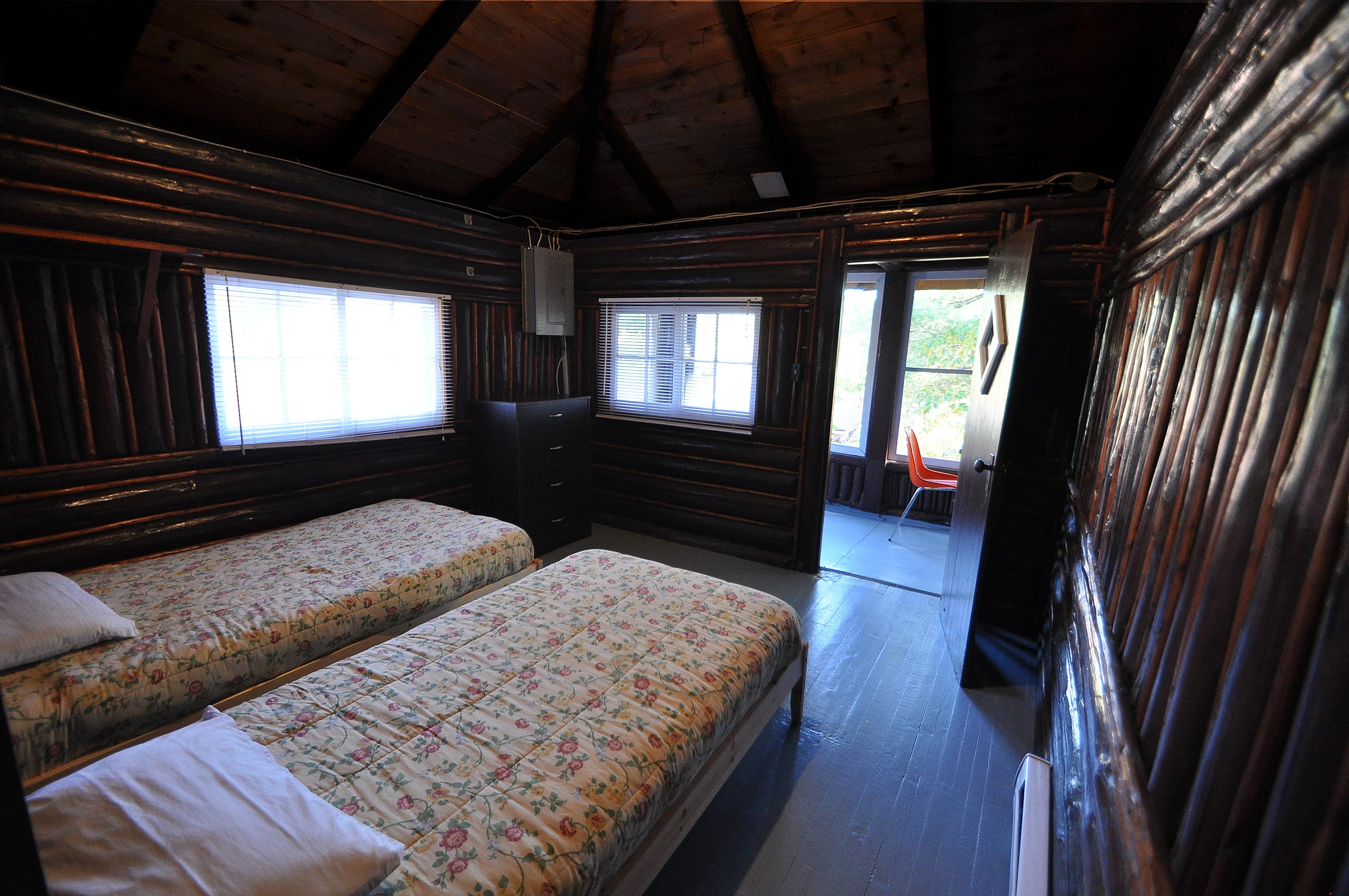 Cabin 13 bedroom with two single beds.