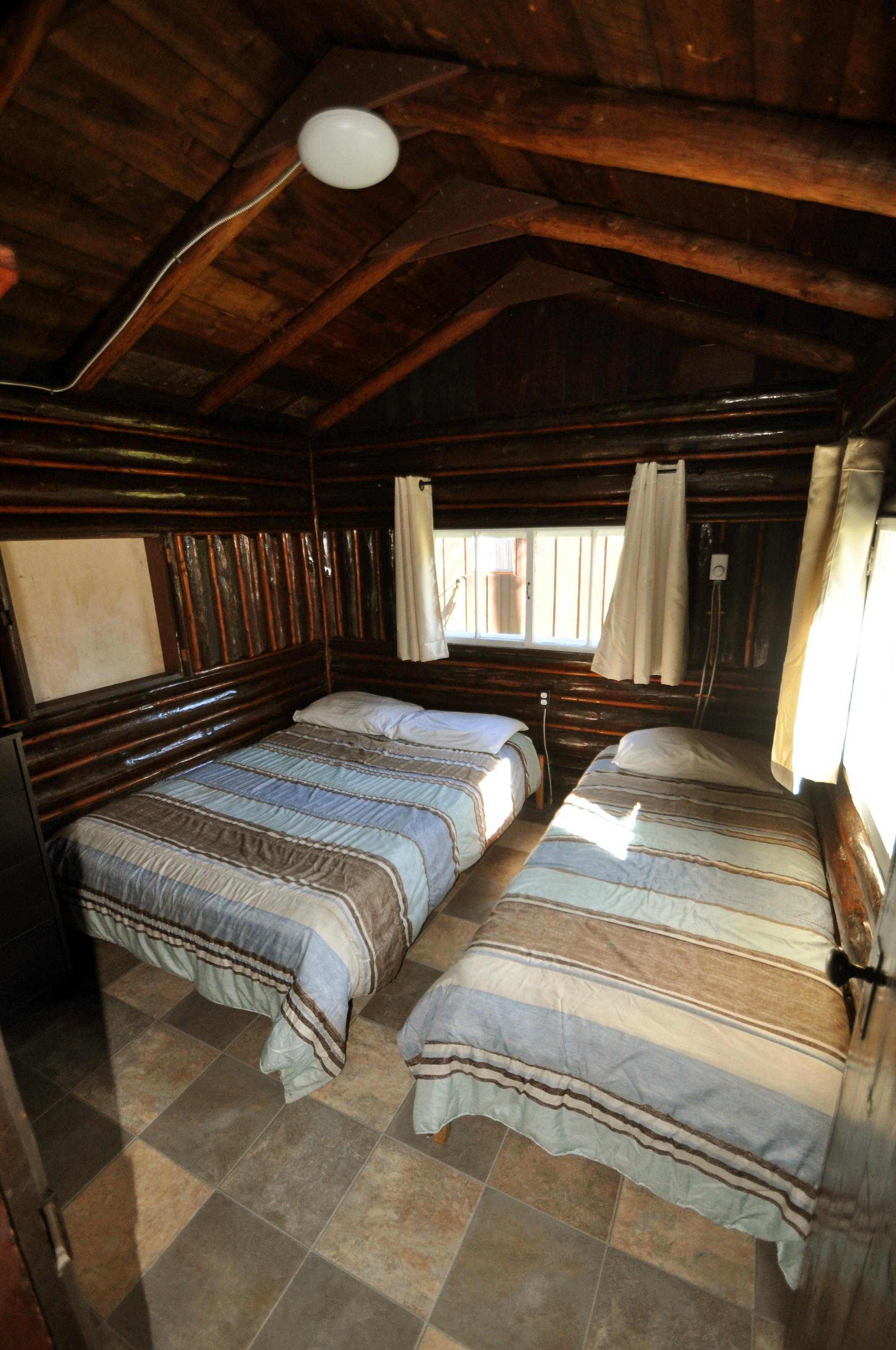 Cabin 5 - bedroom with two beds.