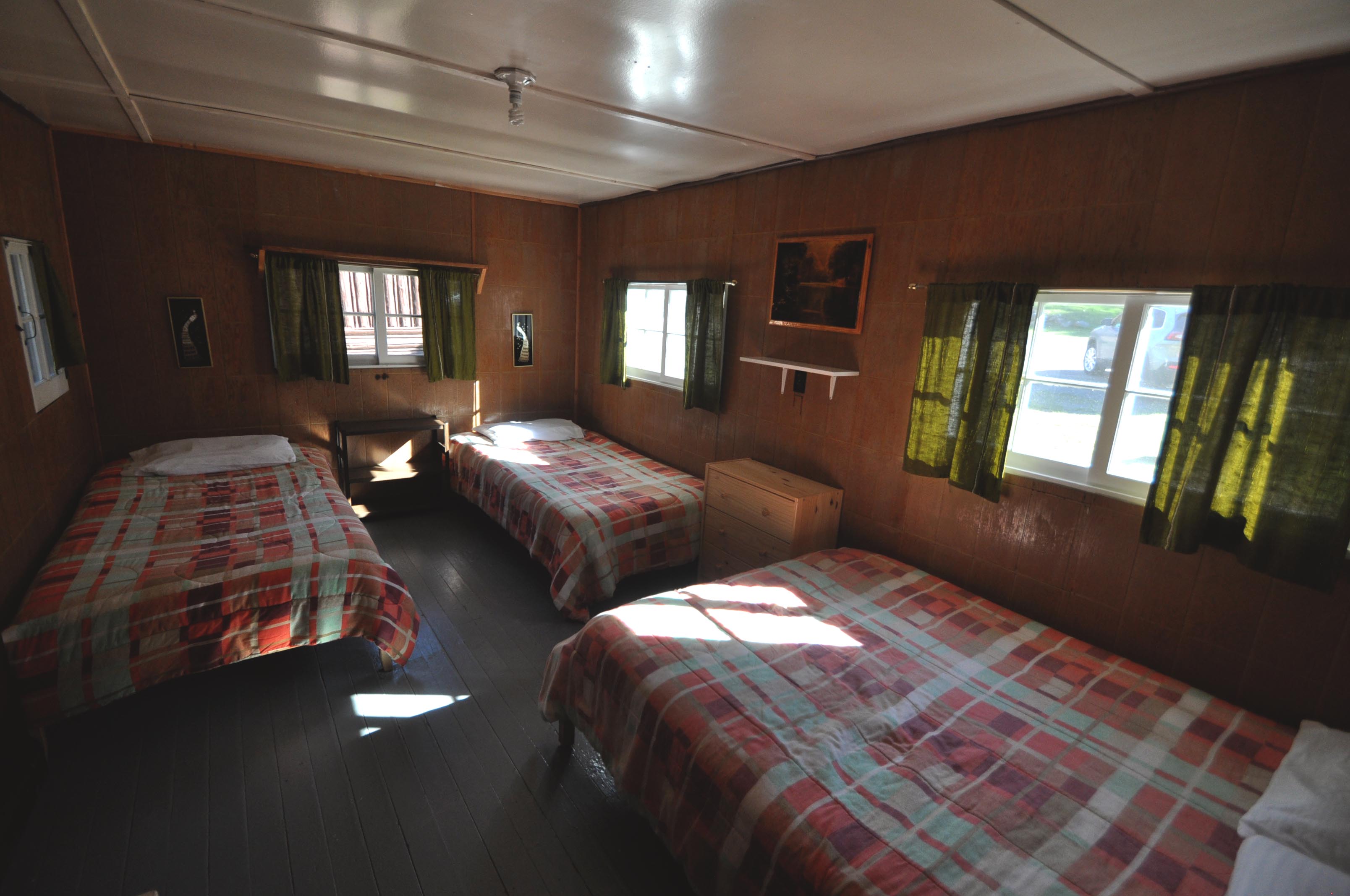 Cabin 6 - bedroom with three beds.