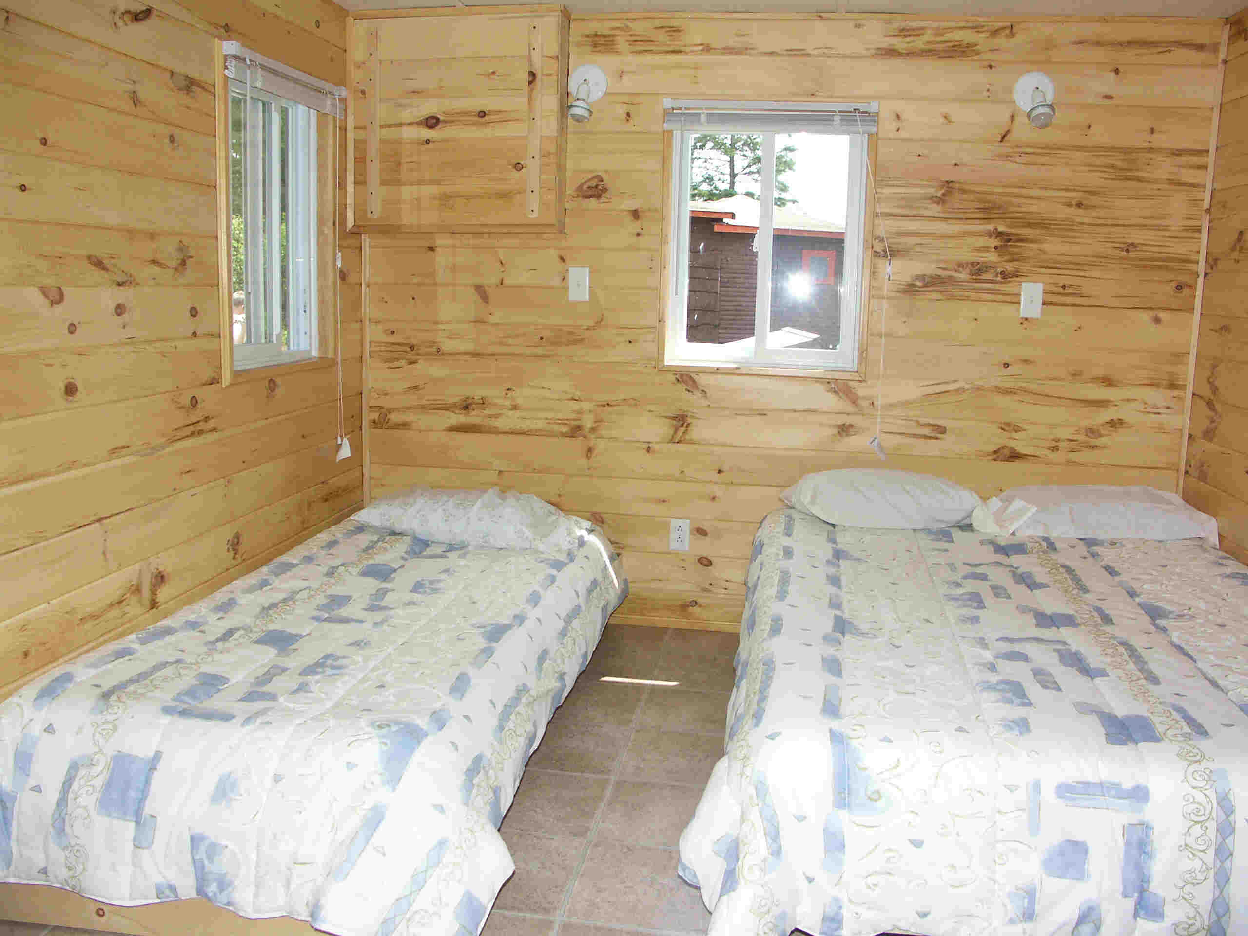Cabin 8 - bedroom with two beds.