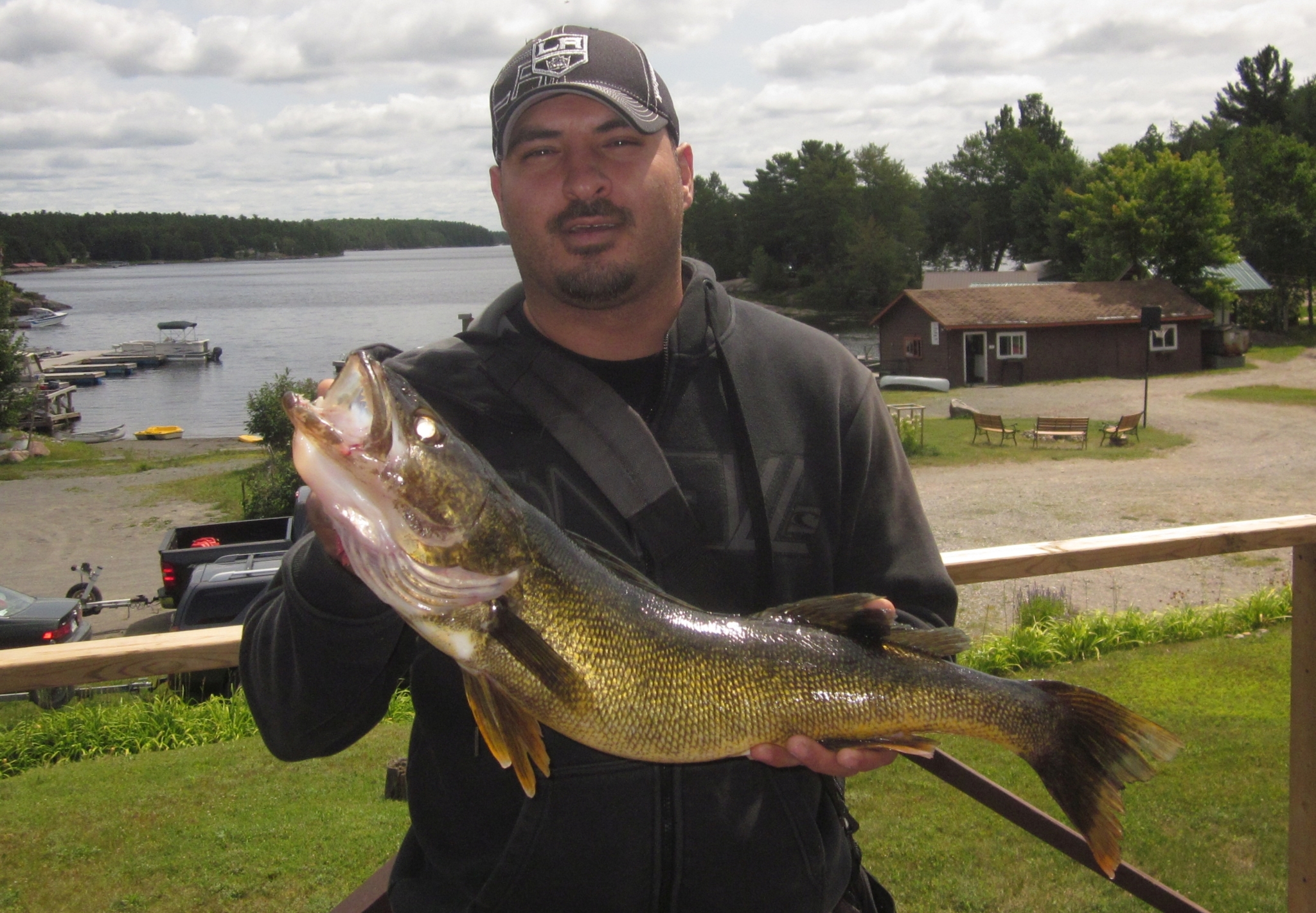 Mike holding 28 inch walleye.
