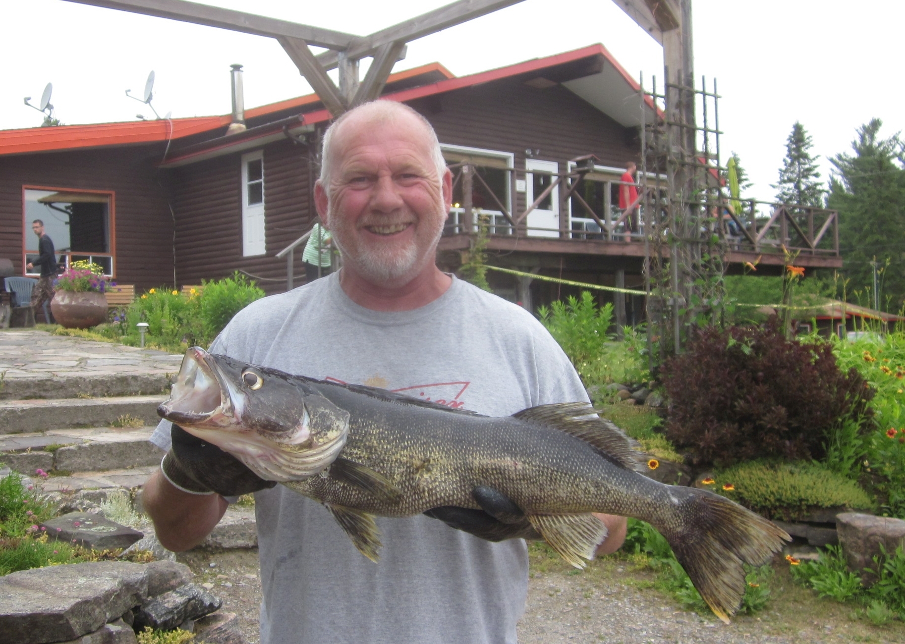 Kevin holding a 29 and one fourth inch Walleye.