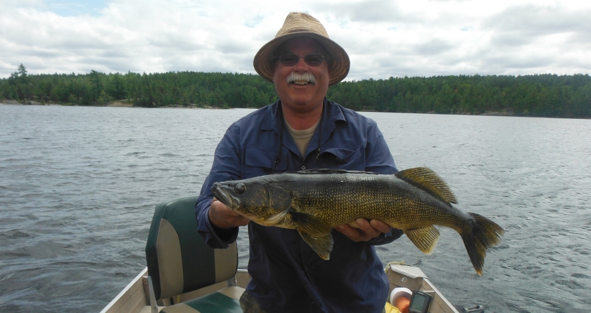 Mike with his 8 lbs 29 inch Walleye in the North Channel on Blue Rapala.