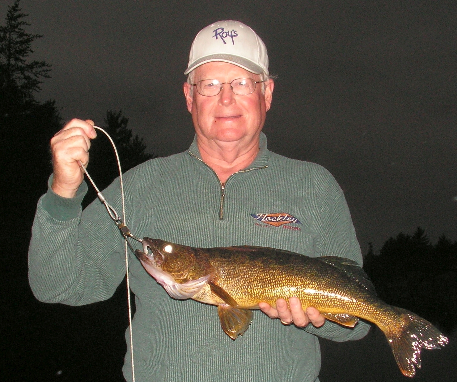 Roy Bredow holding walleye.